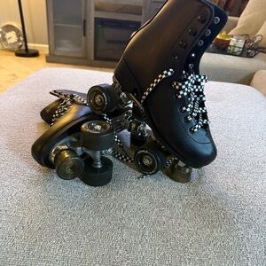 Black Roller Skates with Checkered Laces
